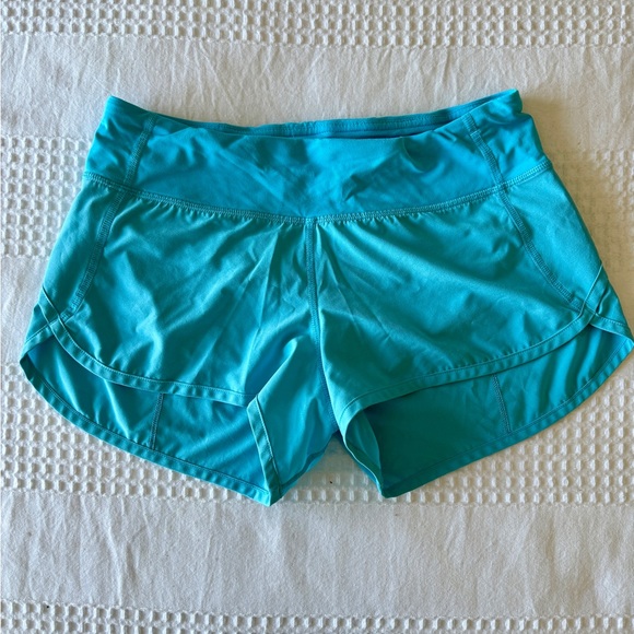 Turquoise blue lululemon speed shorts. - Picture 2 of 3